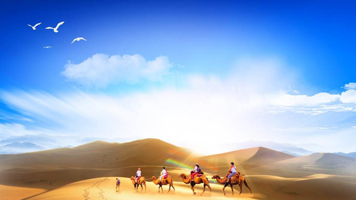 蓝天白云沙漠驼队PPT背景图片