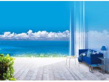 蓝天白云下海岸上的家居PPT背景图片